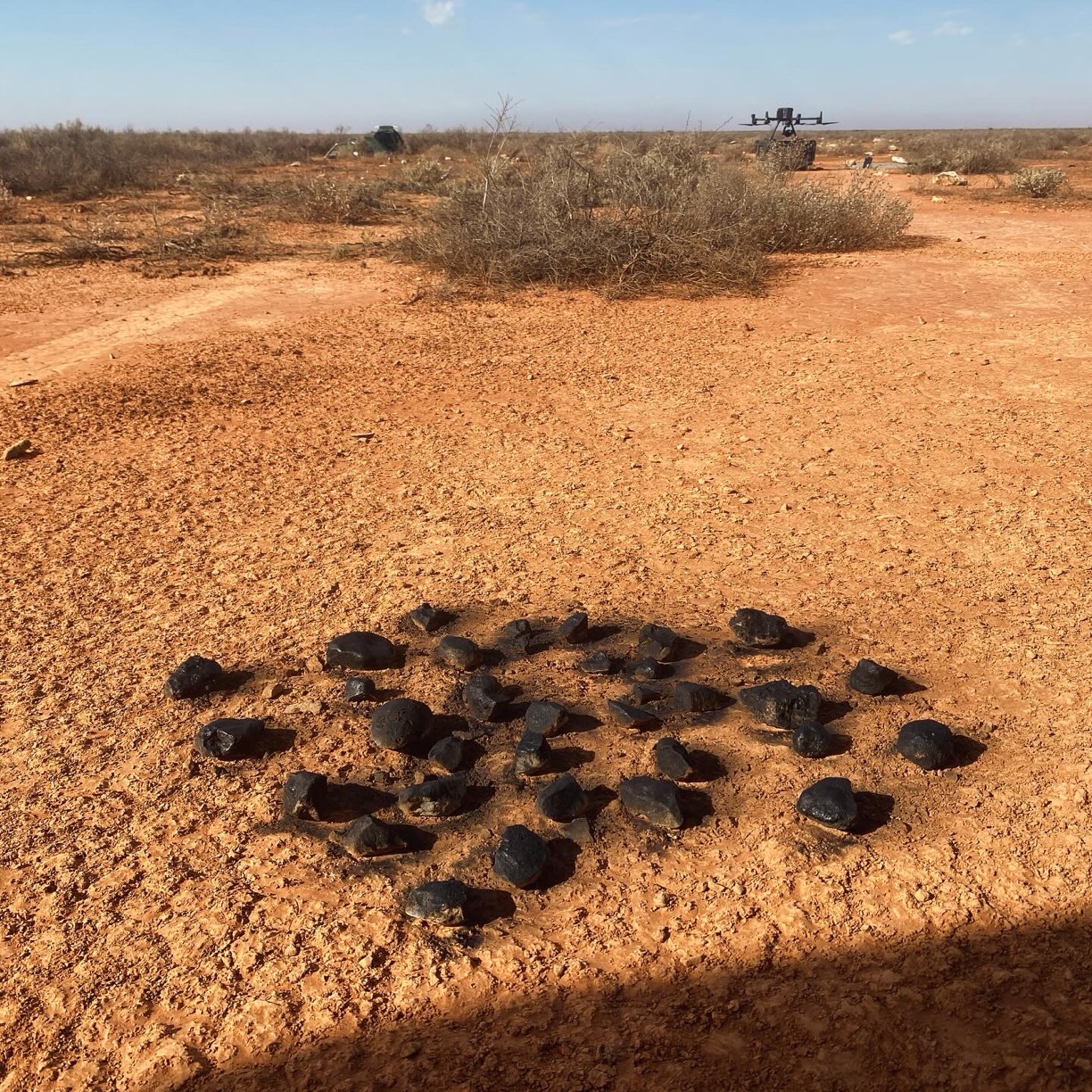 Fake meteorite factory. ps: we need more black spray paint; the can became damaged as the lid was opened. On a related note, Anderson still doesn't know his own strength.